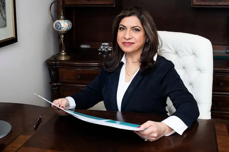 cmo dinar sajan sitting at her office