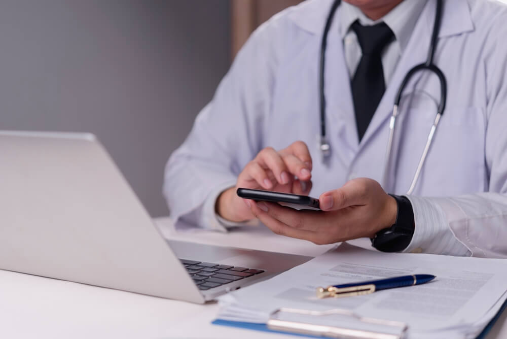 Remote healthcare administrators coordinating scheduling, authorizations, and patient communication.